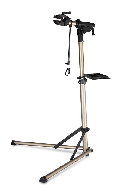 CXWXC CXR10 aluminum bike repair stand with a mountain bike mounted