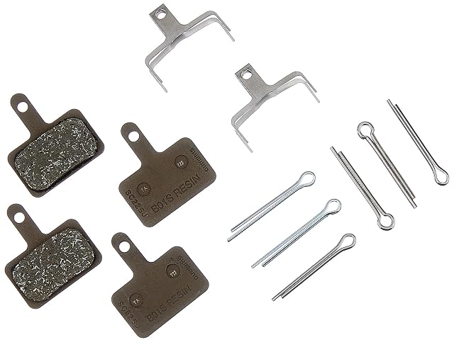 Shimano B05S resin disc brake pads with their retaining springs