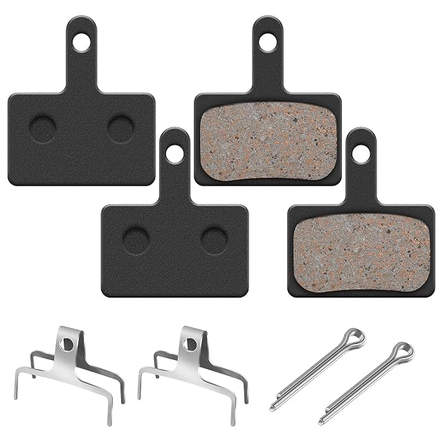 TOPBELIEF disc brake pads, two pairs with their springs